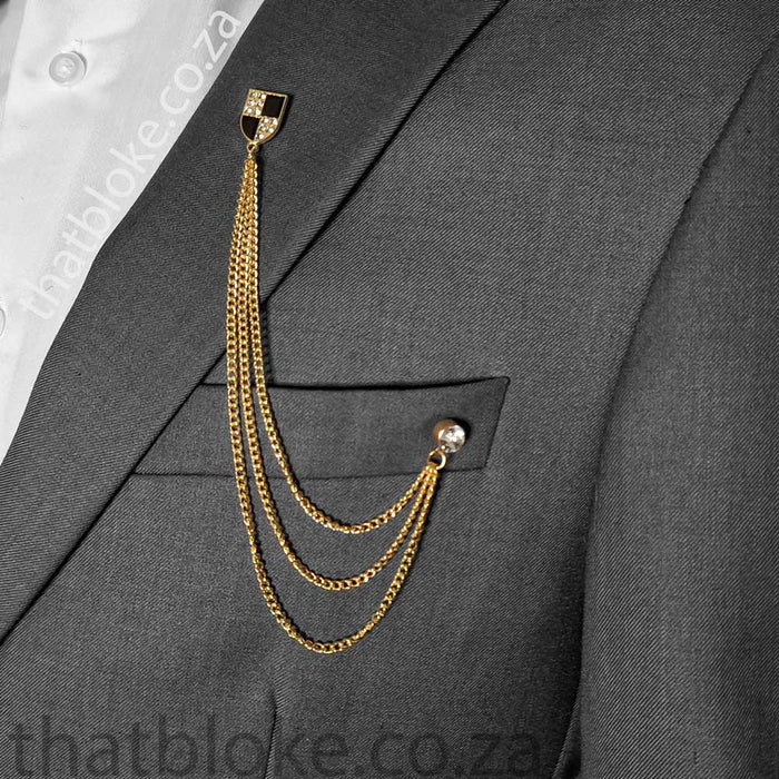 Mens Brooch Pin Shield With Chain and Jewel Gold Black On Suit Display
